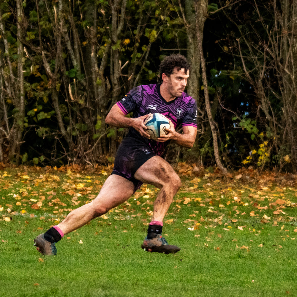 Bisons RFC player sprinting with the ball